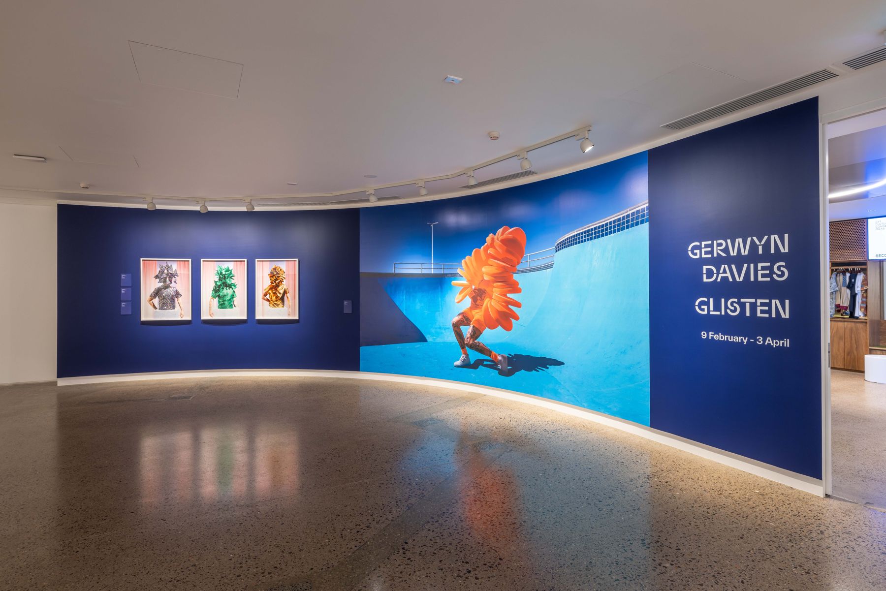 Gerwyn Davies exhibition on a curved blue wall at SECCA