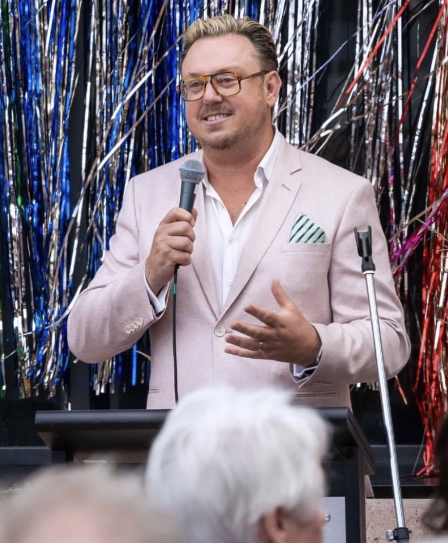 Iain Dawson speaking at an exhibition opening
